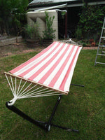 Single Red and White Canvas Hammock with Spreader Bar